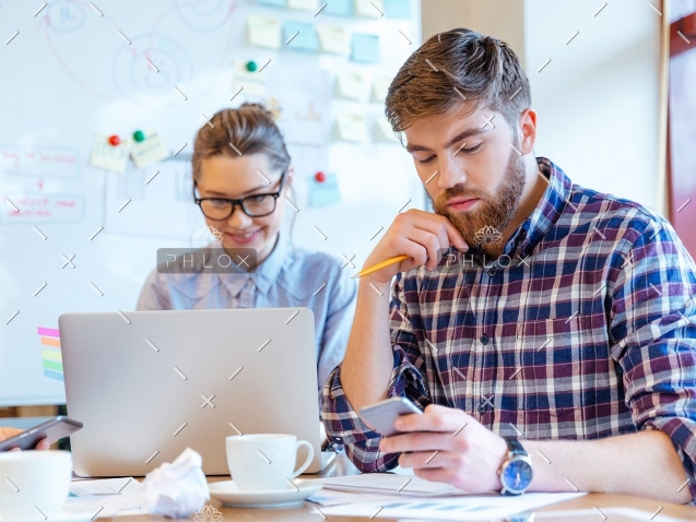 demo-attachment-127-people-working-in-office-P3DBYE3